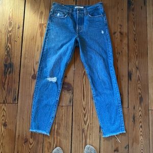 Levi’s size 27 in a dark blue wash